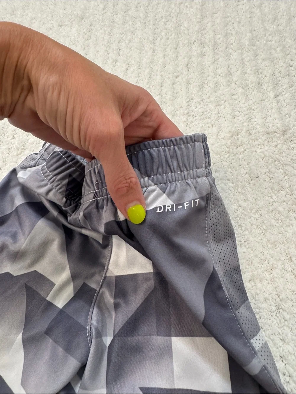 Nike Gray Geometric Print Kids Athletic Shorts with Yellow Swoosh